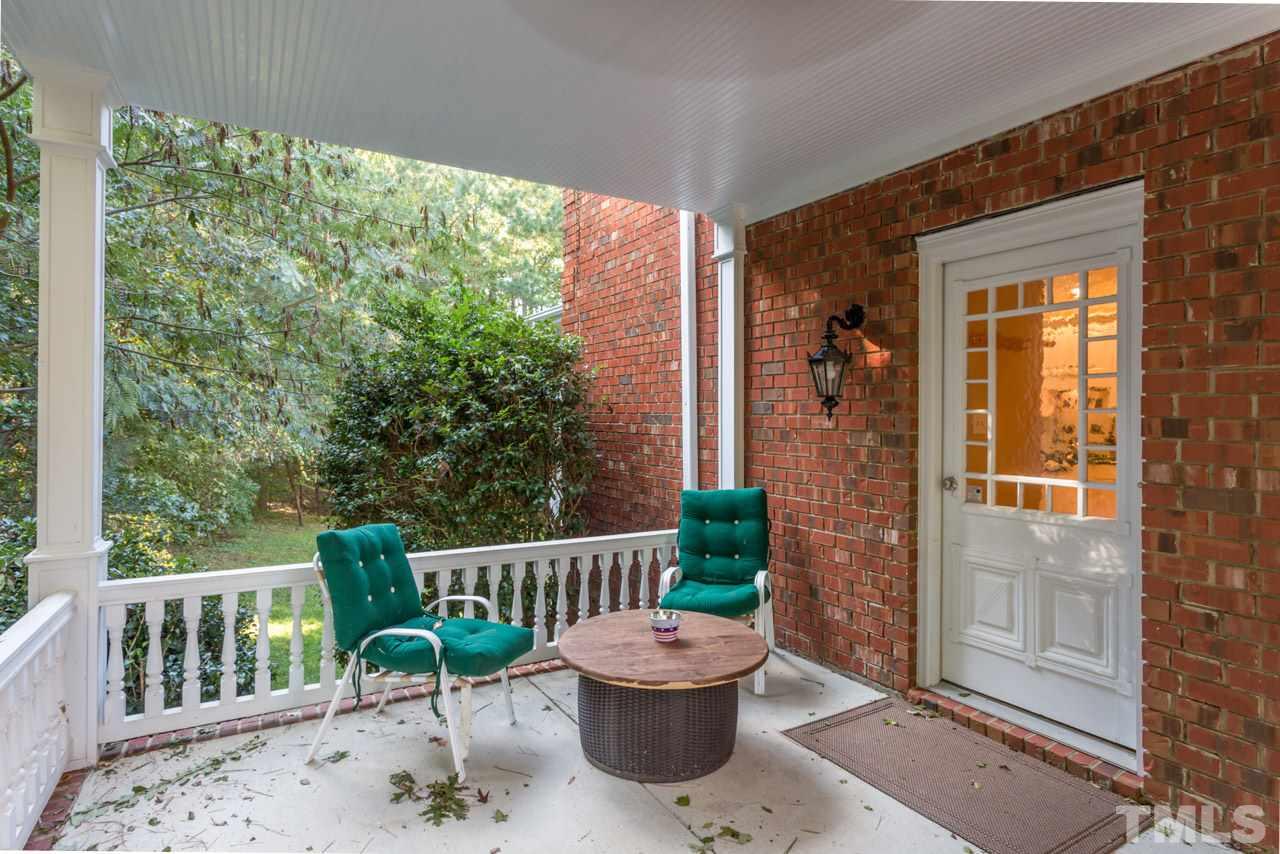4625 Gamelyn Walk Raleigh, NC 27612 - Photo 22 of 25 a view of a chair and table in the balcony