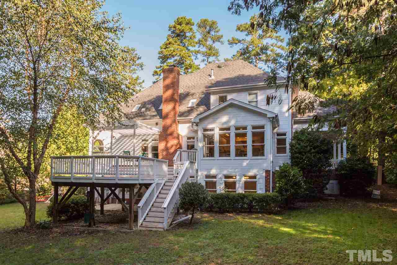 4625 Gamelyn Walk Raleigh, NC 27612 - Photo 24 of 25 a front view of a house with garden
