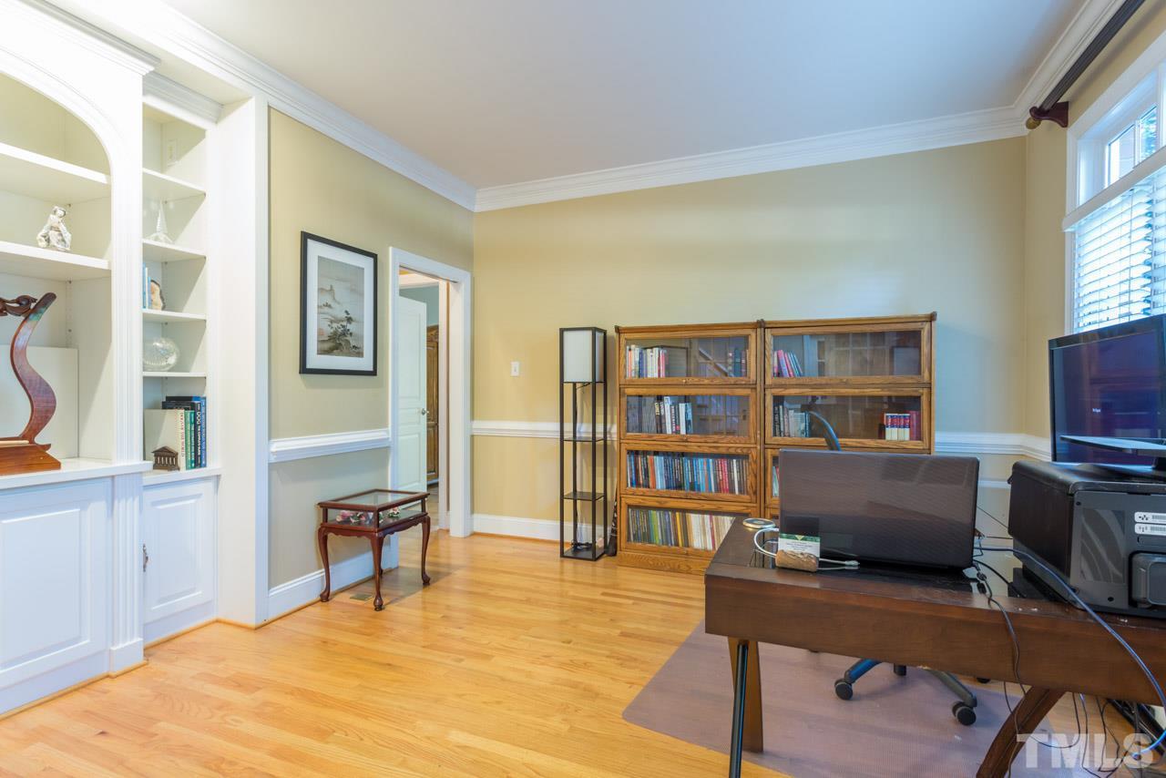 4625 Gamelyn Walk Raleigh, NC 27612 - Photo 4 of 25 a view of a workspace with furniture and a window