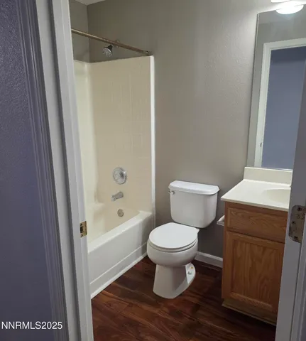 a bathroom with a toilet a sink and a bathtub