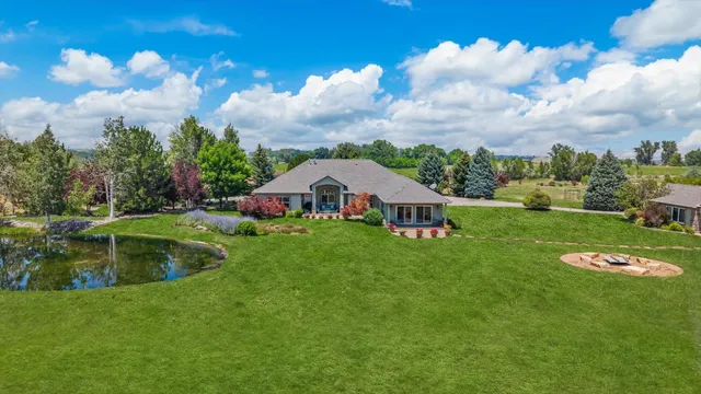 a view of a garden in front of a house