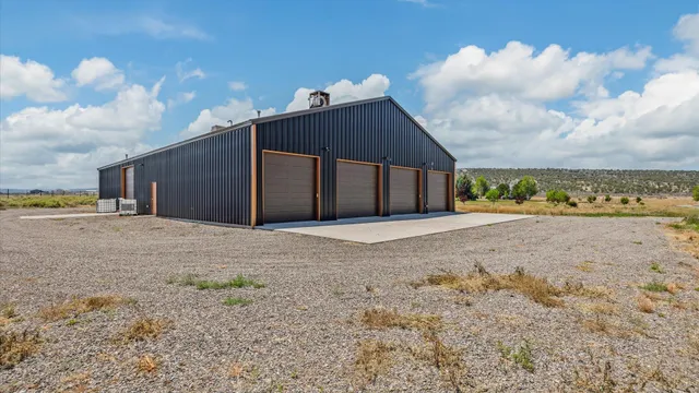 a view of a garage with parked cars