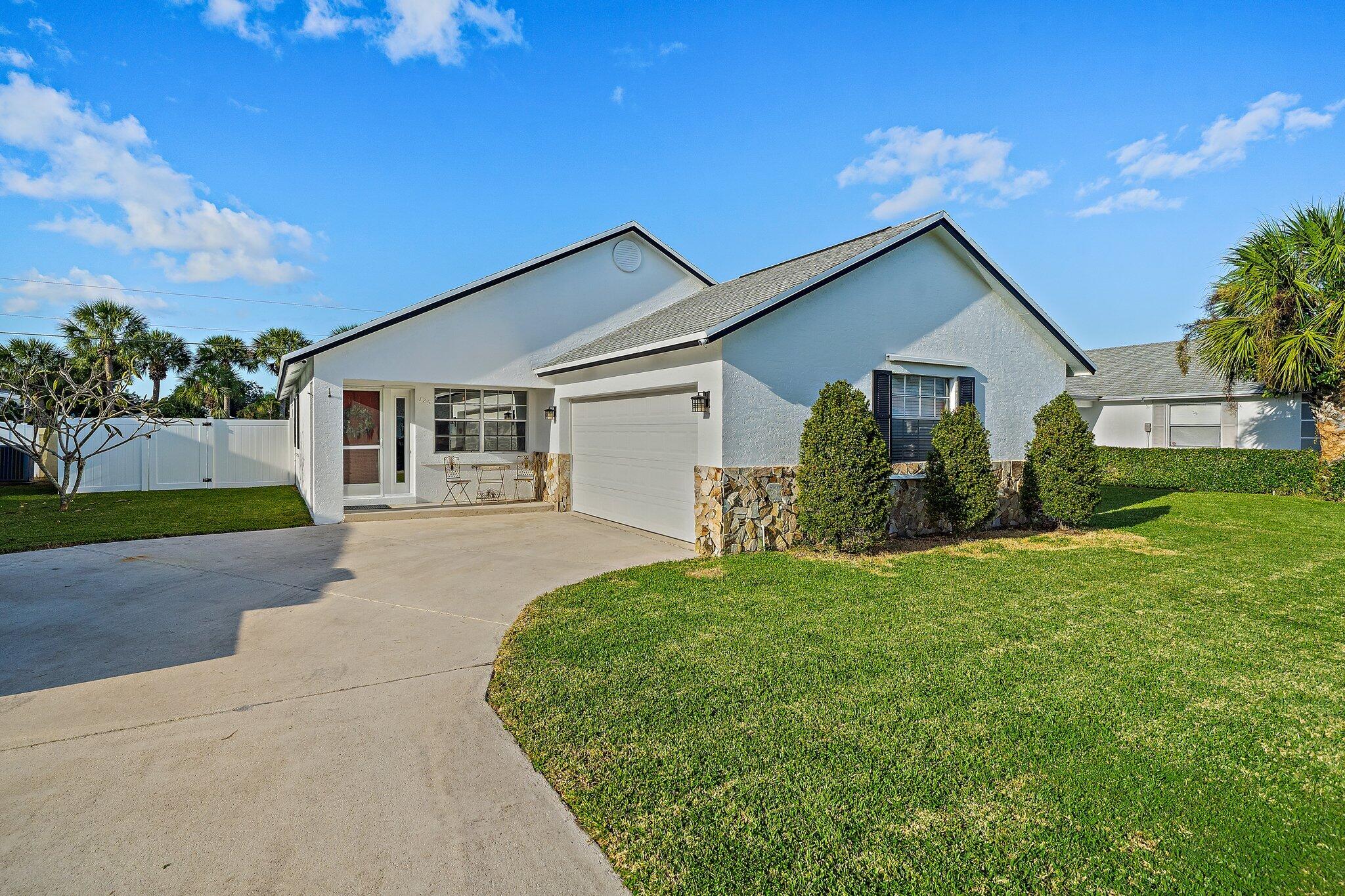 125 Raintree Trail Jupiter, FL 33458 - Photo 1 of 35 002-125RaintreeTrail-Jupiter-FL-SMALL