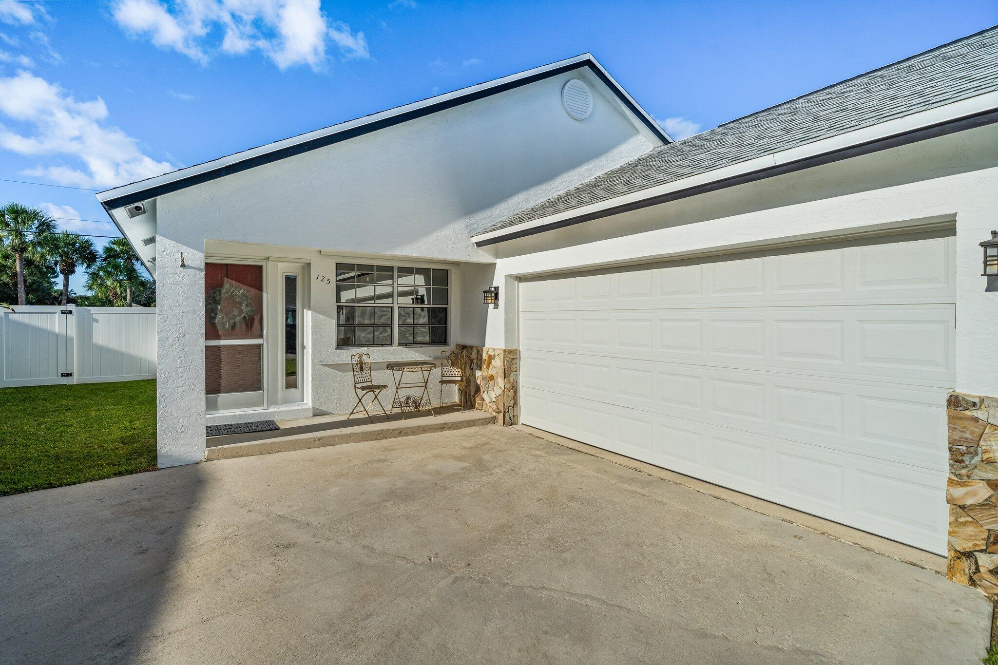 125 Raintree Trail Jupiter, FL 33458 - Photo 3 of 35 005-125RaintreeTrail-Jupiter-FL-SMALL