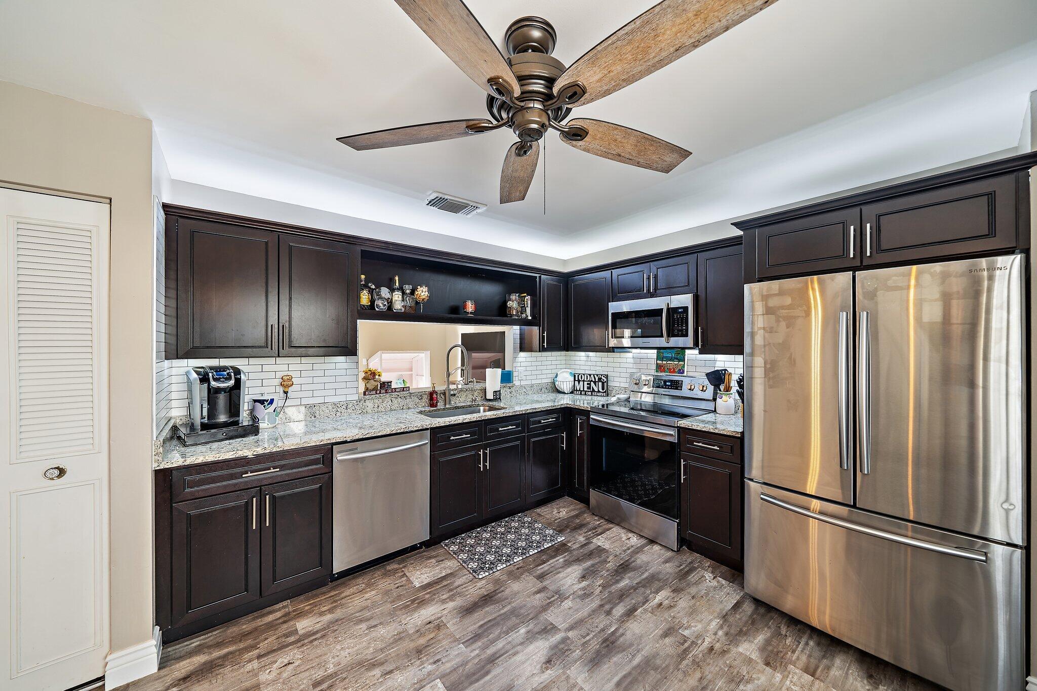 125 Raintree Trail Jupiter, FL 33458 - Photo 7 of 35 009-125RaintreeTrail-Jupiter-FL-SMALL
