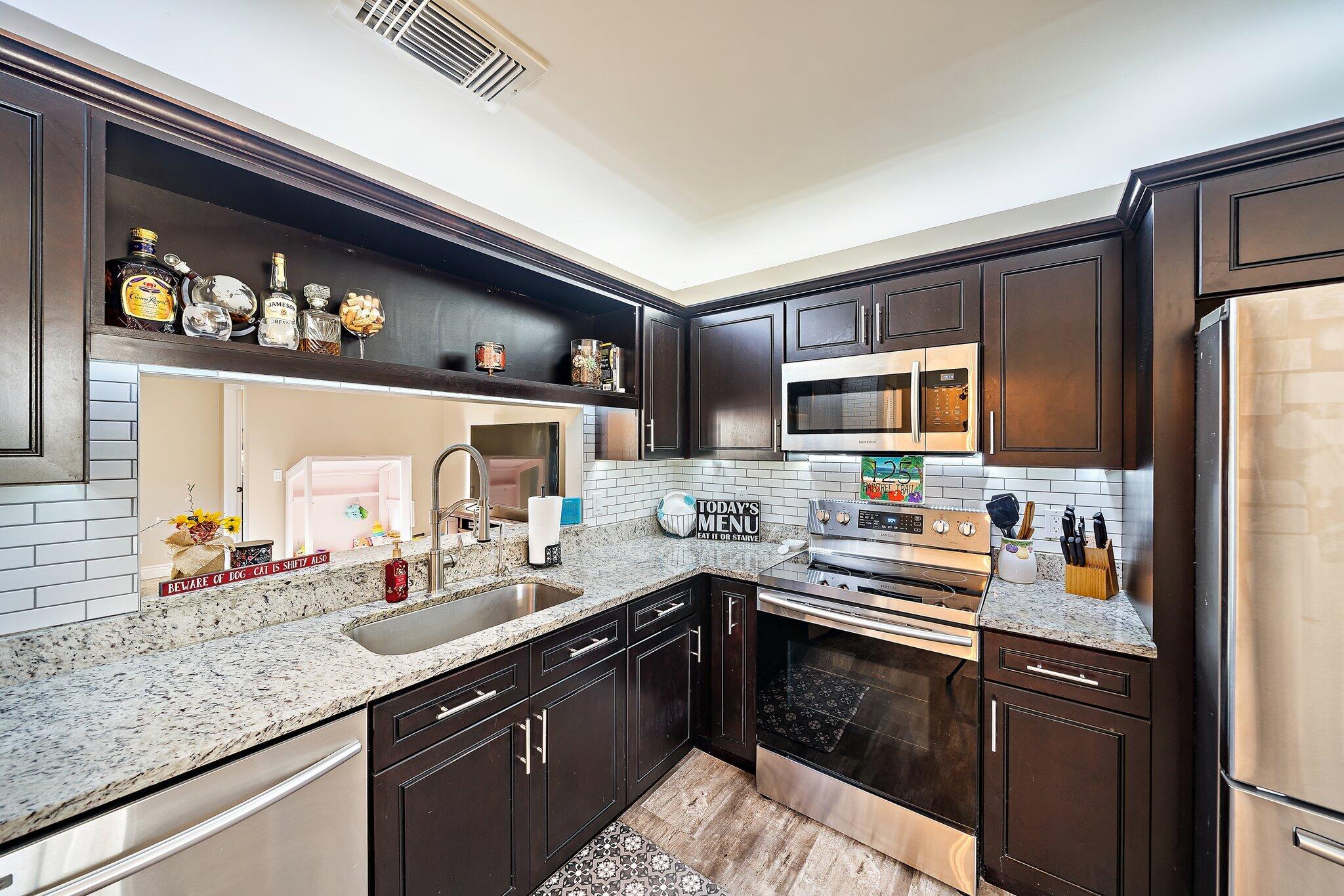125 Raintree Trail Jupiter, FL 33458 - Photo 8 of 35 010-125RaintreeTrail-Jupiter-FL-SMALL