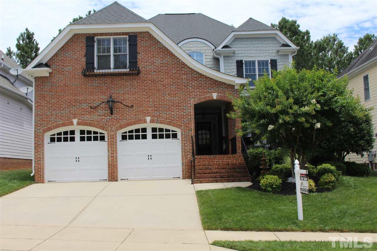 12336 Beestone Lane Raleigh, NC 27614 - Photo 1 of 21 a front view of a house with a yard