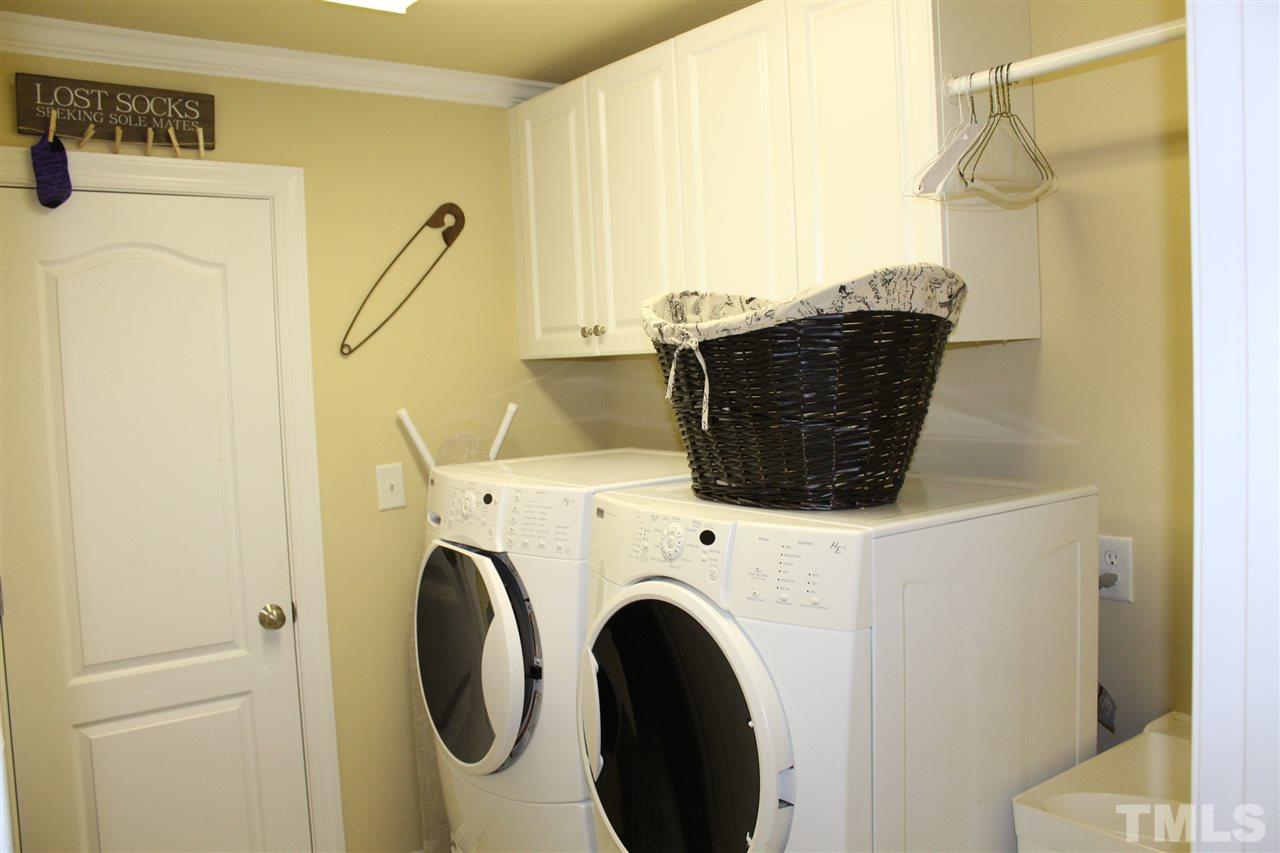 12336 Beestone Lane Raleigh, NC 27614 - Photo 21 of 21 a utility room with dryer and washer