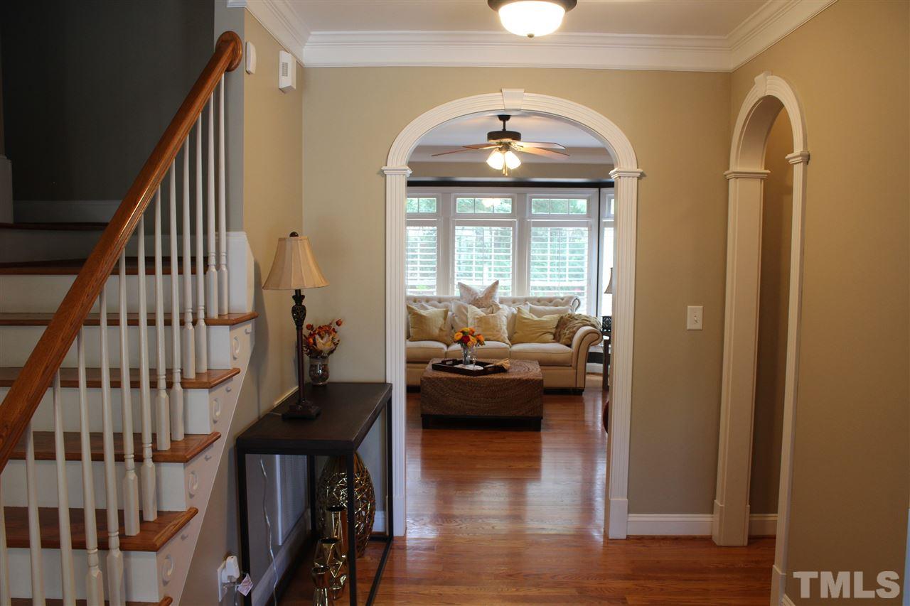 12336 Beestone Lane Raleigh, NC 27614 - Photo 4 of 21 a view of a livingroom with furniture and wooden floor