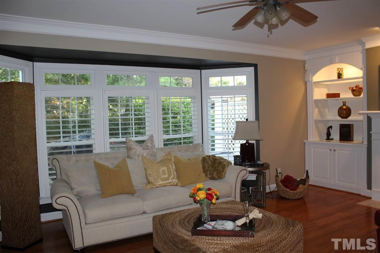 12336 Beestone Lane Raleigh, NC 27614 - Photo 7 of 21 a living room with furniture and a large window