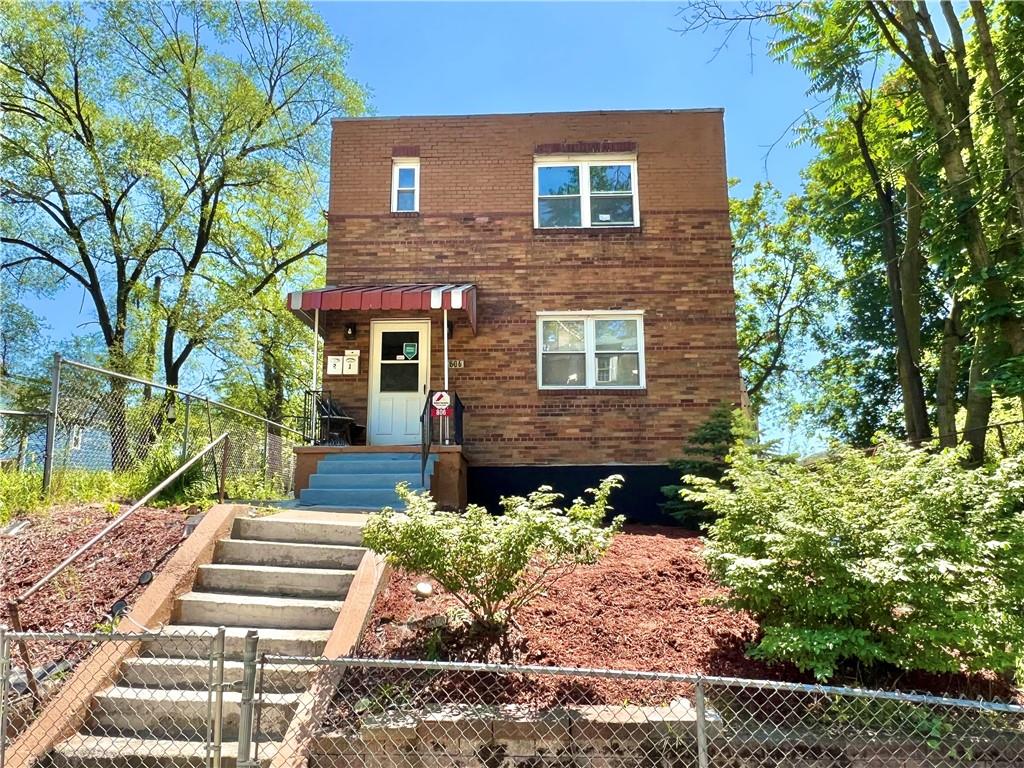 806 Inwood Street Pittsburgh, PA 15208 - Photo 1 of 17 a front view of a house with a garden