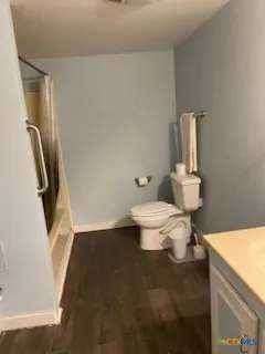 wooden floor and window in an empty room