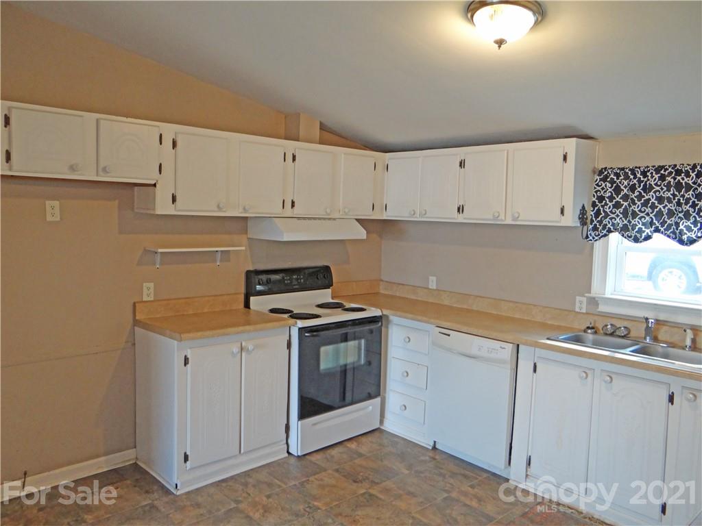 4053 Chevlot Hills Road Sherrills Ford, NC 28673 - Photo 13 of 22 a kitchen with cabinets appliances and a sink