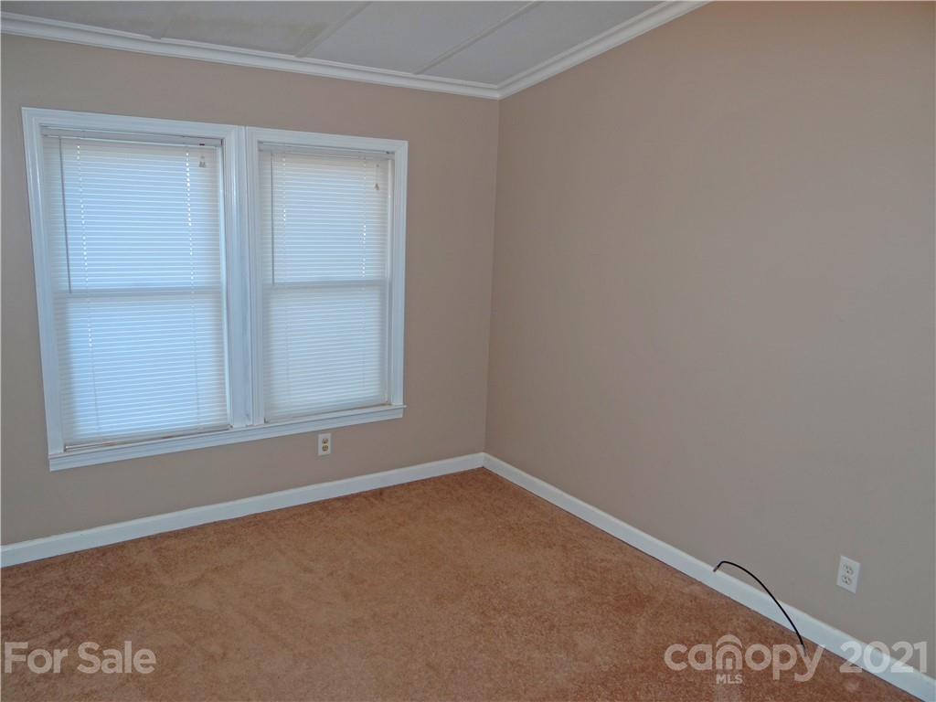 4053 Chevlot Hills Road Sherrills Ford, NC 28673 - Photo 19 of 22 a view of an empty room with a window