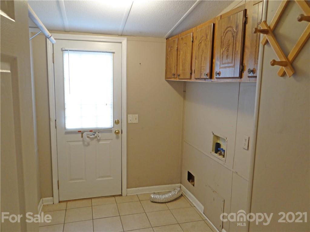 4053 Chevlot Hills Road Sherrills Ford, NC 28673 - Photo 20 of 22 a bathroom with a granite countertop shower and a sink