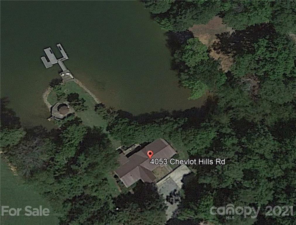 4053 Chevlot Hills Road Sherrills Ford, NC 28673 - Photo 6 of 22 an aerial view of residential house with outdoor space and trees all around