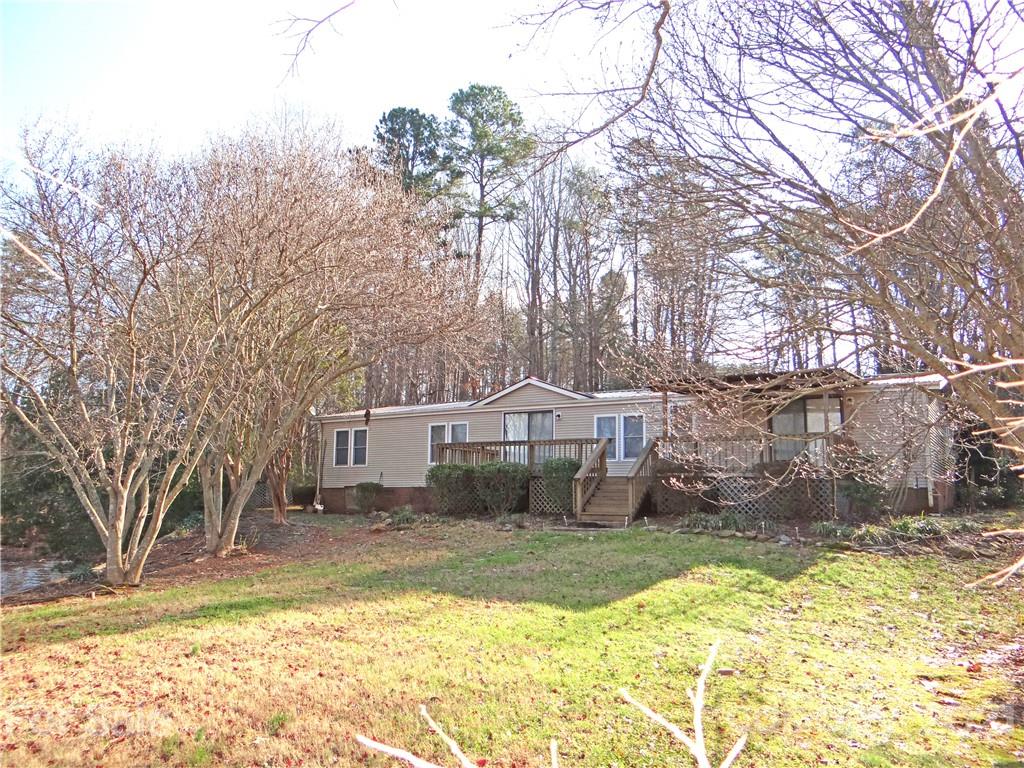 4053 Chevlot Hills Road Sherrills Ford, NC 28673 - Photo 7 of 22 a front view of a house with a yard covered with snow