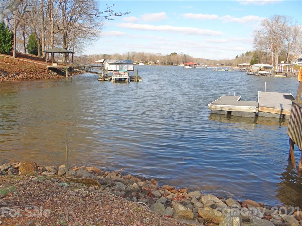 4053 Chevlot Hills Road Sherrills Ford, NC 28673 - Photo 8 of 22 a view of a lake with houses
