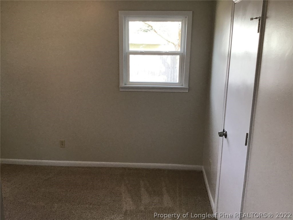 3334 Raintree Drive Fayetteville, NC 28304 - Photo 3 of 11 an empty room with a window