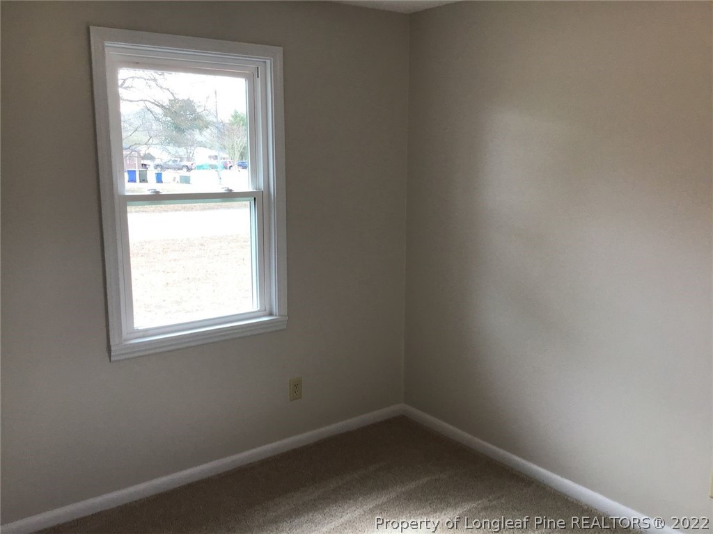 3334 Raintree Drive Fayetteville, NC 28304 - Photo 5 of 11 an empty room with a window
