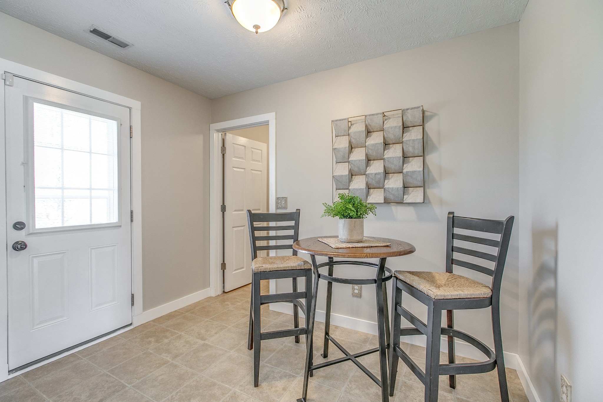 1025 Maxfli Drive Murfreesboro, TN 37129 - Photo 14 of 42 a view of a dining room with furniture and chandelier
