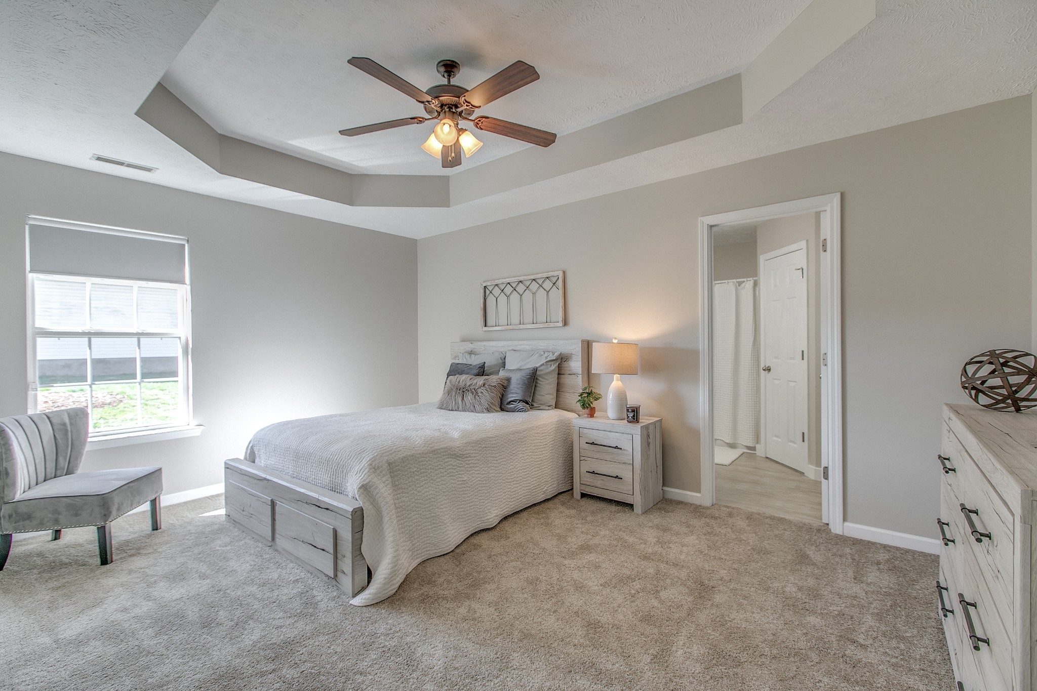 1025 Maxfli Drive Murfreesboro, TN 37129 - Photo 18 of 42 a spacious bedroom with a bed and a chandelier