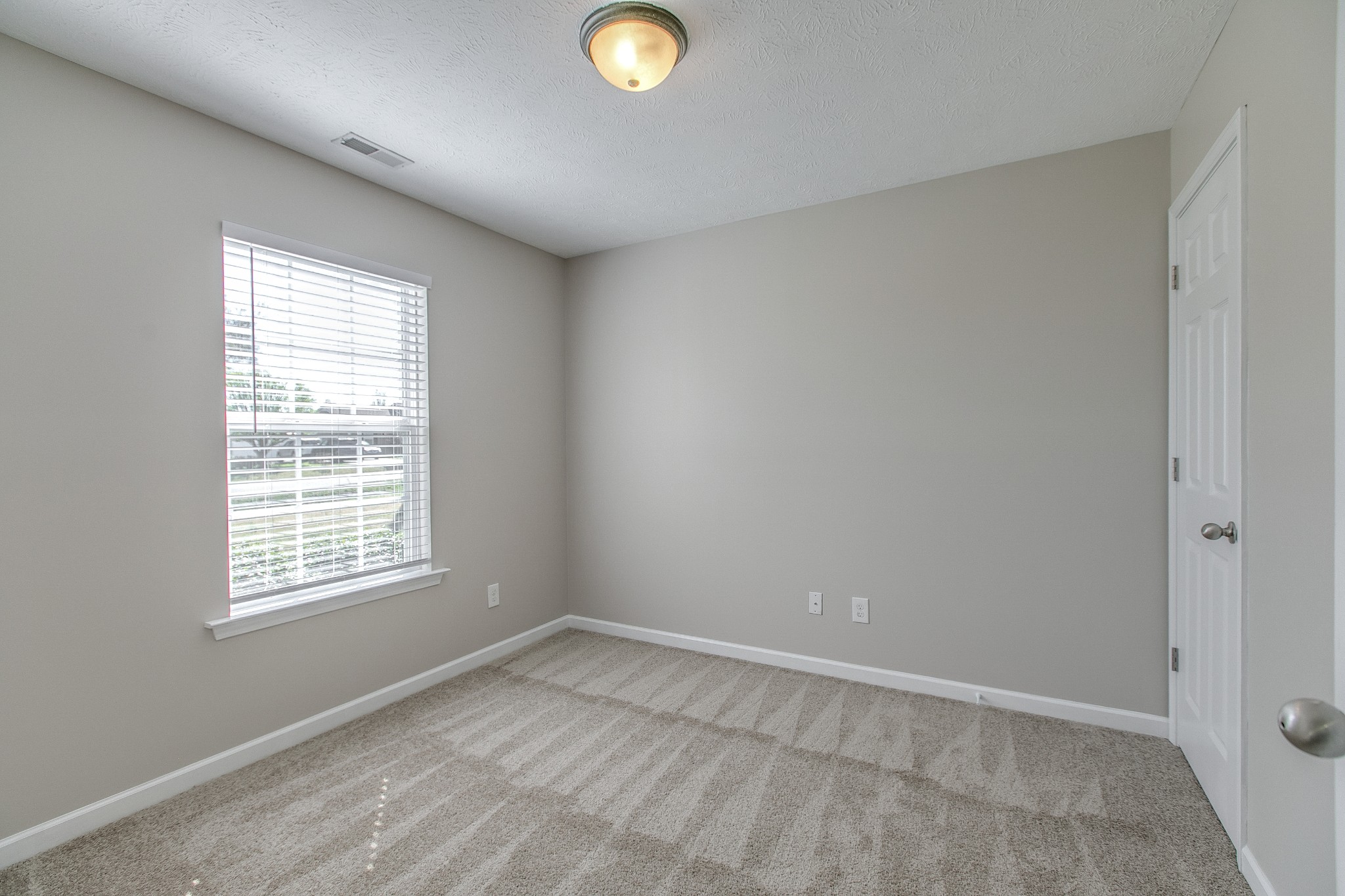 1025 Maxfli Drive Murfreesboro, TN 37129 - Photo 21 of 42 a view of an empty room and window