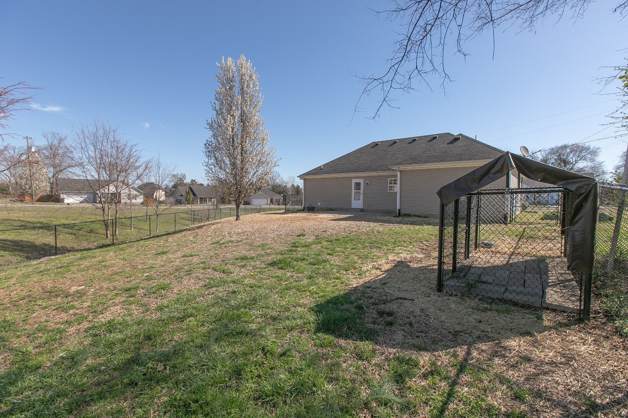 1025 Maxfli Drive Murfreesboro, TN 37129 - Photo 31 of 42 a house with trees in the background