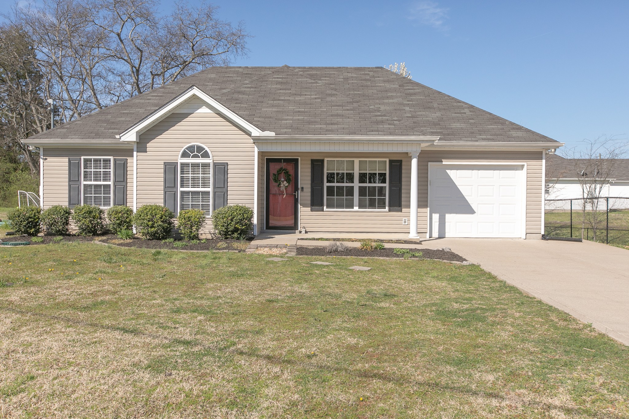 1025 Maxfli Drive Murfreesboro, TN 37129 - Photo 42 of 42 a front view of a house with garden