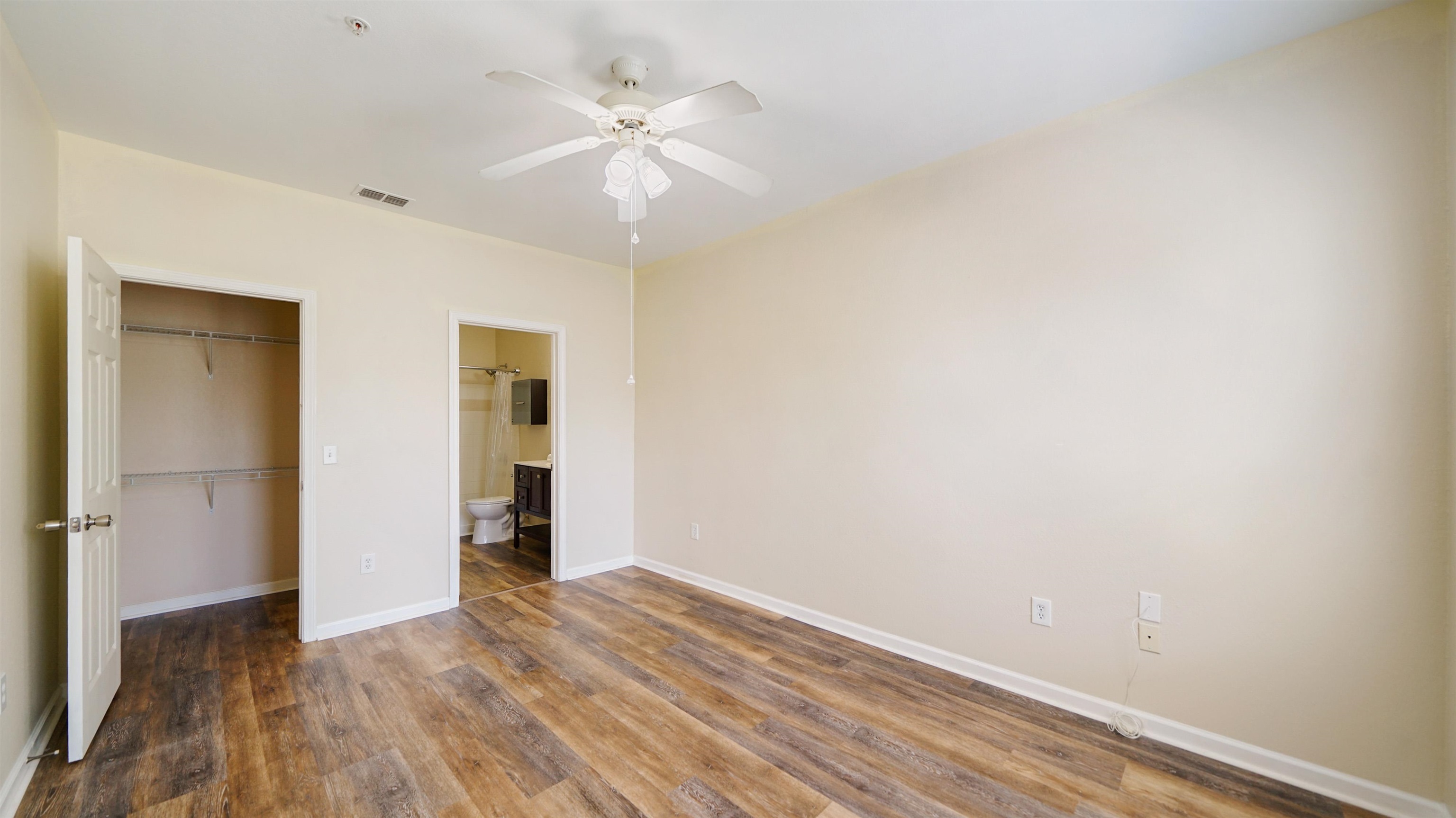 8290 Gate Parkway, Unit 709 Jacksonville, FL 32216 - Photo 14 of 30 a view of an empty room with wooden floor