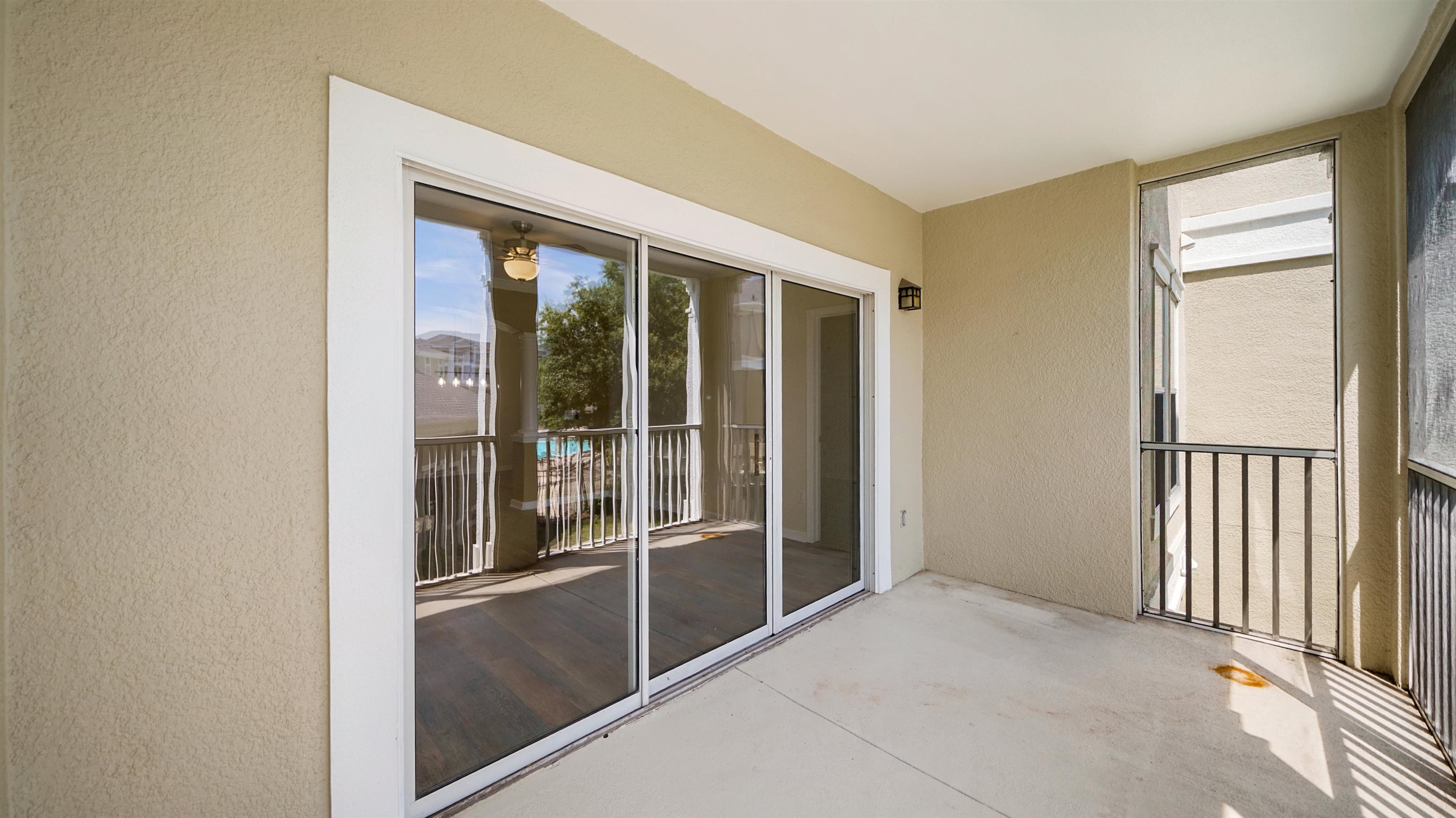 8290 Gate Parkway, Unit 709 Jacksonville, FL 32216 - Photo 20 of 30 a view of empty room with floor to ceiling window