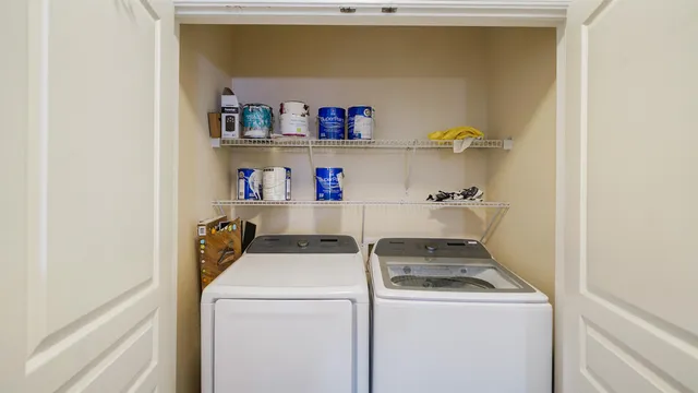 a utility room with dryer and washer