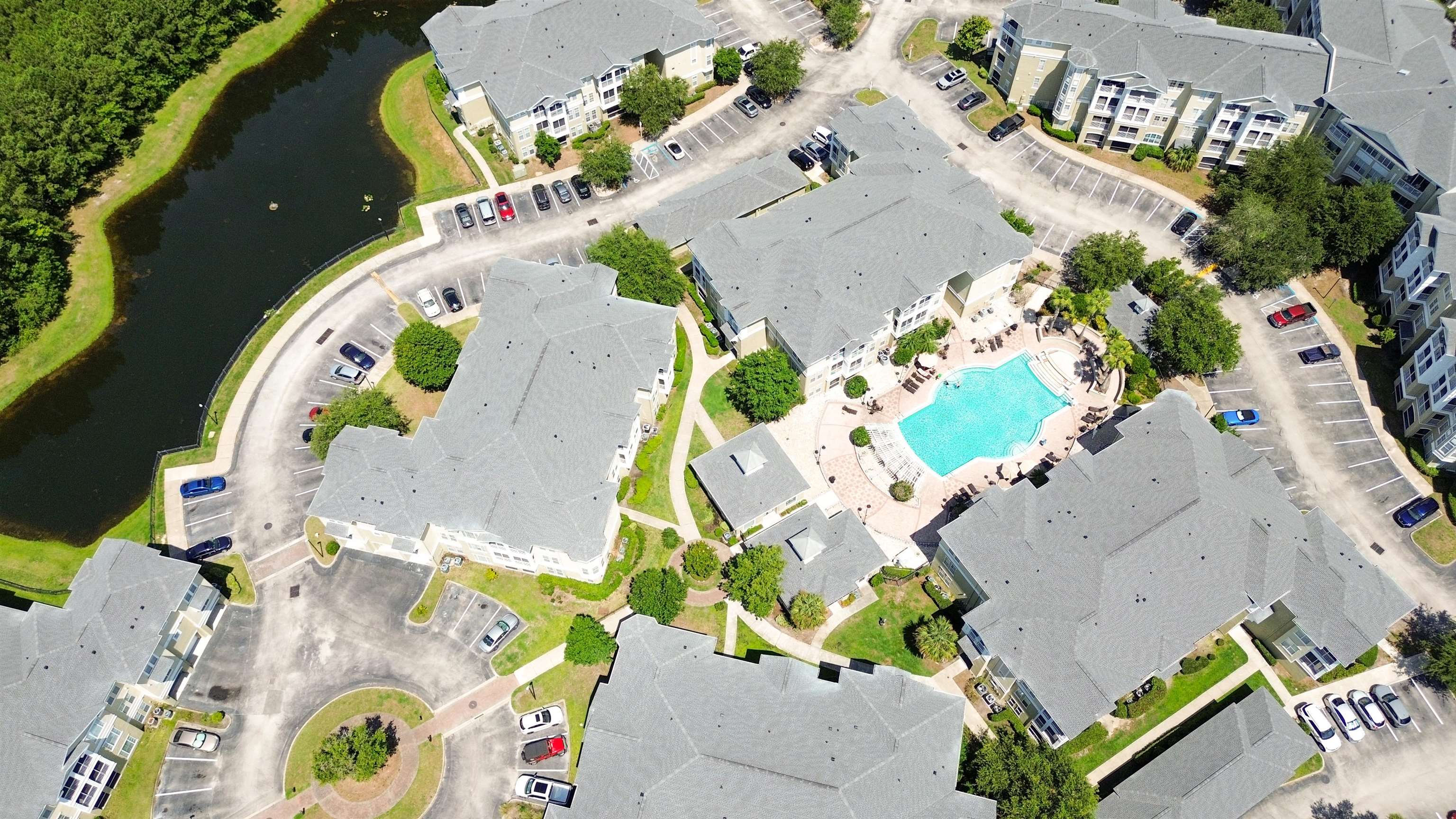 8290 Gate Parkway, Unit 709 Jacksonville, FL 32216 - Photo 26 of 30 an aerial view of a swimming pool