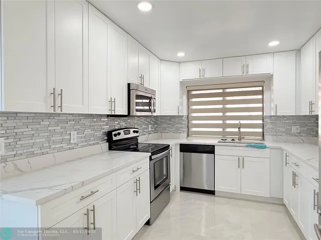 a view of a room with a window