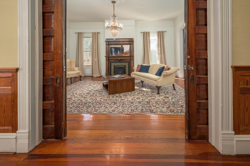 715 Broadway Columbus, GA 31901 - Photo 16 of 75 a living room with furniture and a fireplace