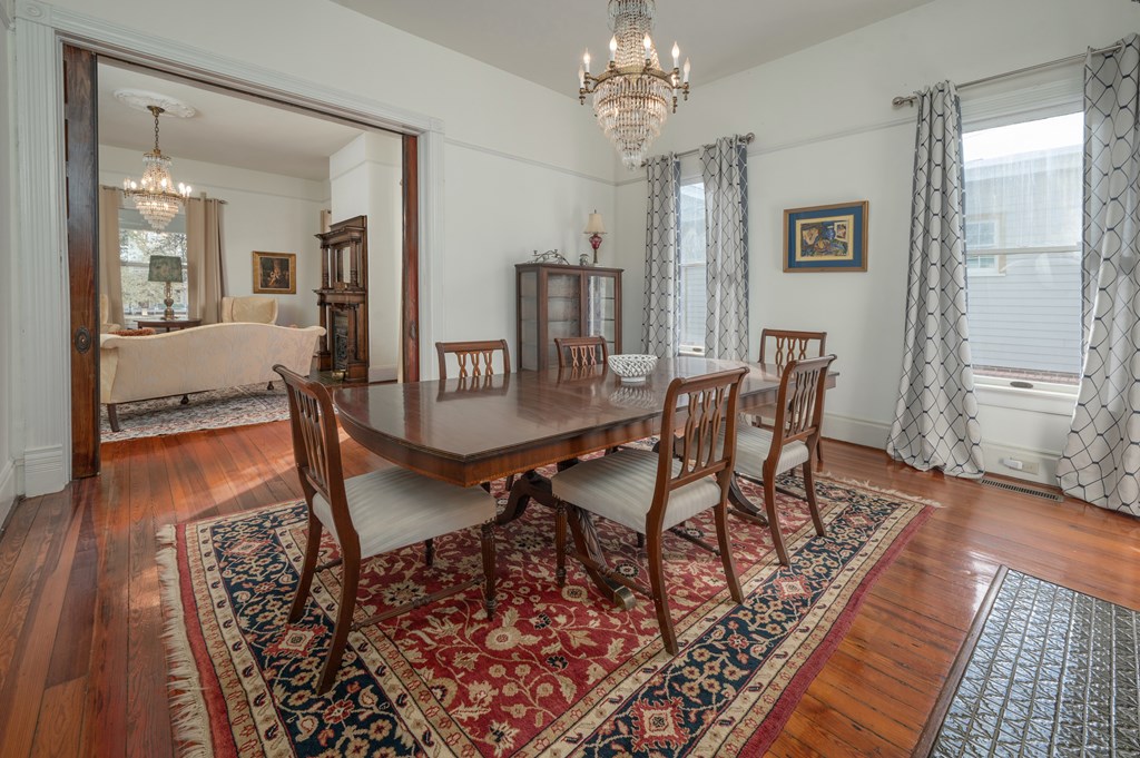 715 Broadway Columbus, GA 31901 - Photo 24 of 75 a view of a dining room with furniture window and wooden floor