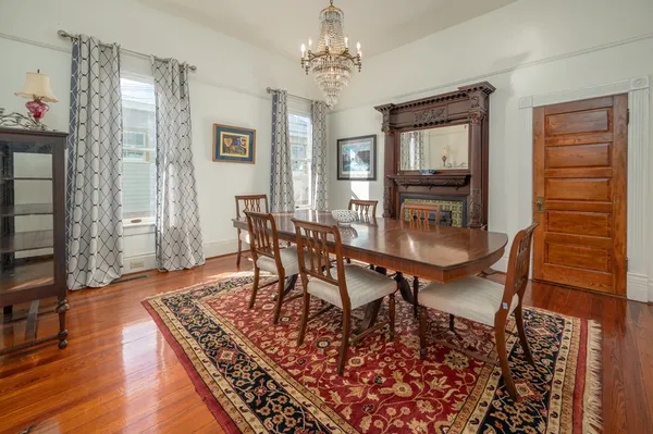 a dining room with furniture and window