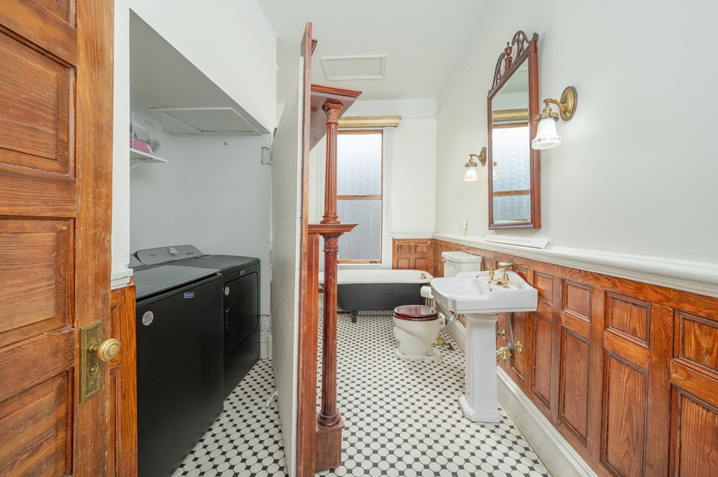 715 Broadway Columbus, GA 31901 - Photo 33 of 75 a bathroom with a sink and a mirror