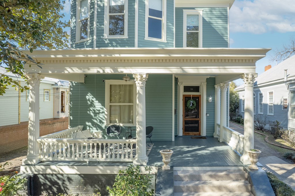 715 Broadway Columbus, GA 31901 - Photo 6 of 75 a front view of a building with glass door and glass door