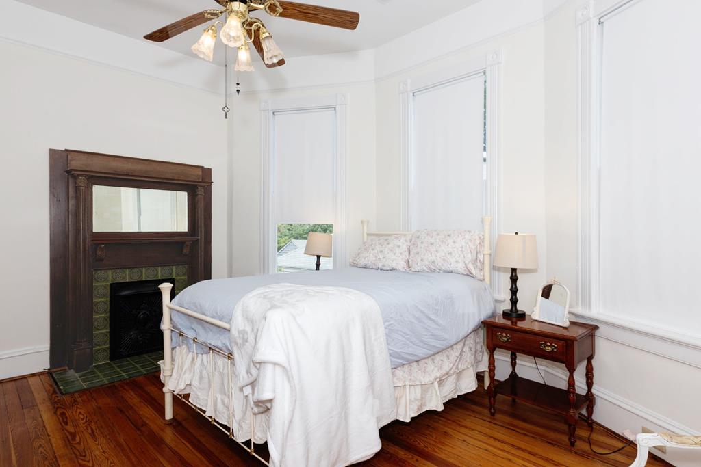 715 Broadway Columbus, GA 31901 - Photo 62 of 75 a bedroom with a bed and a dresser