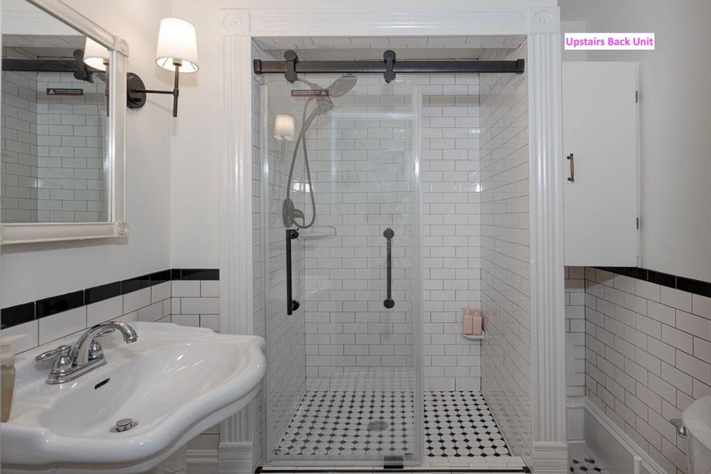 715 Broadway Columbus, GA 31901 - Photo 70 of 75 a bathroom with a sink a toilet and shower