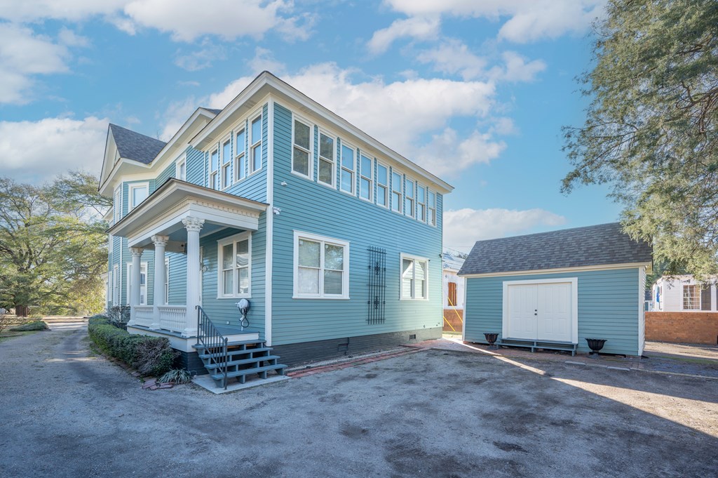 715 Broadway Columbus, GA 31901 - Photo 71 of 75 a view of a house with a yard and garage