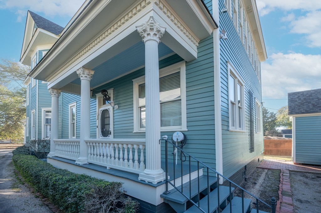 715 Broadway Columbus, GA 31901 - Photo 73 of 75 a view of a brick house with a small porch