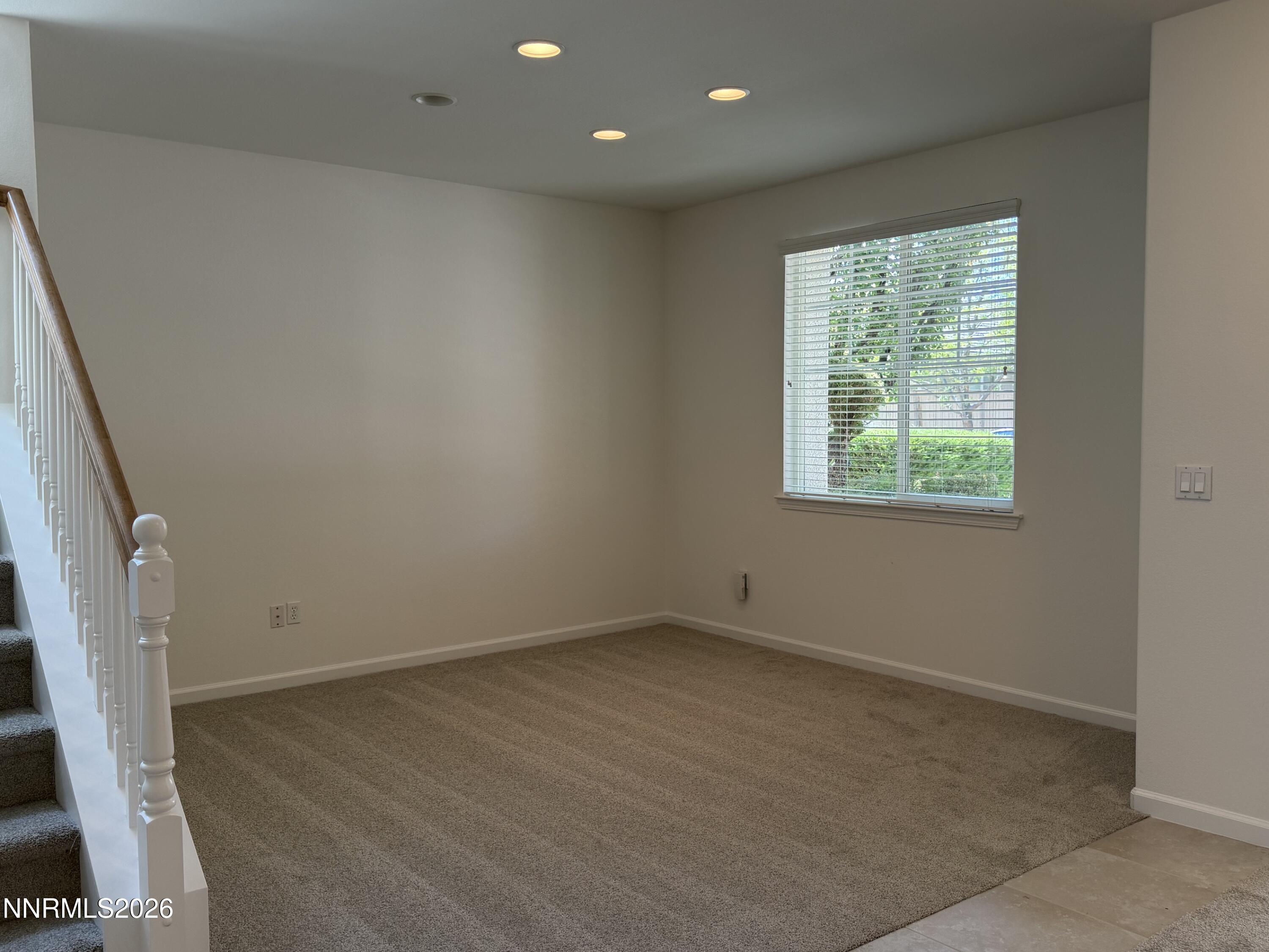 10890 Oakhaven Drive Reno, NV 89521 - Photo 25 of 28 an empty room with a window