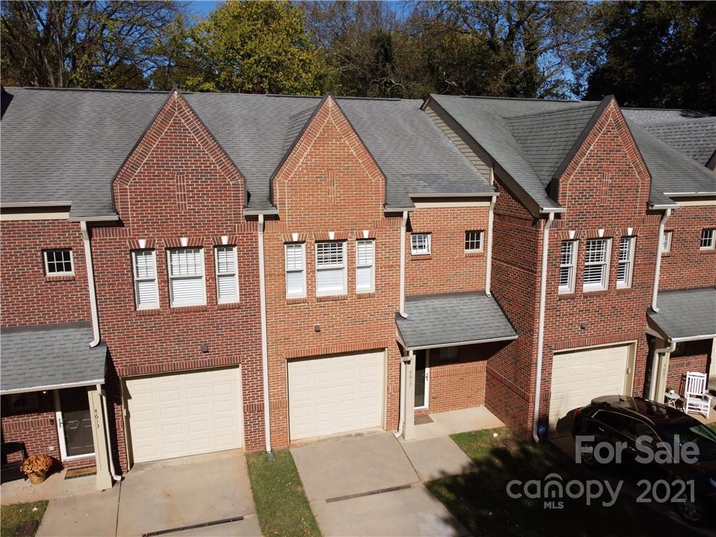 4617 Dabney Vigor Drive Charlotte, NC 28209 - Photo 20 of 23 a aerial view of a house with a garden