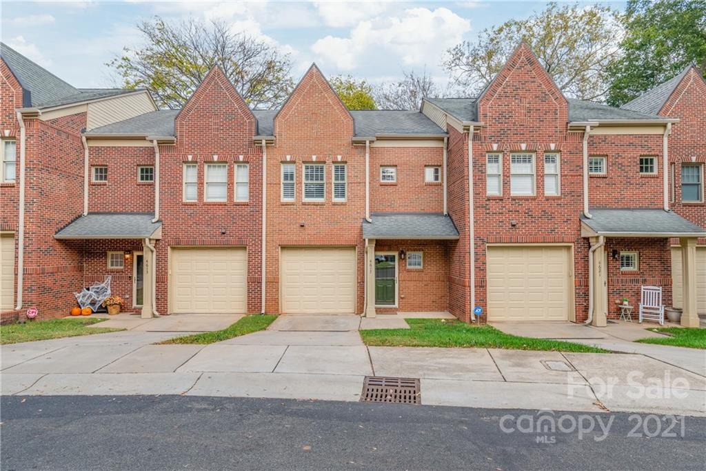 4617 Dabney Vigor Drive Charlotte, NC 28209 - Photo 3 of 23 front view of a brick house with a small yard