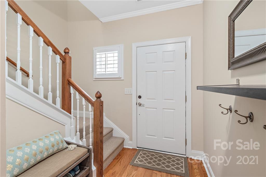 4617 Dabney Vigor Drive Charlotte, NC 28209 - Photo 4 of 23 a view of an entryway with wooden floor