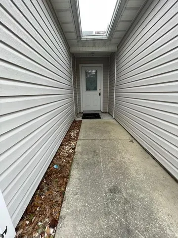 a view of a back yard of the house