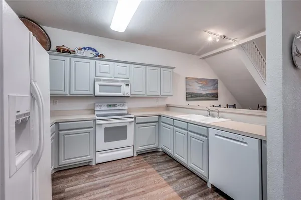 $315,000 | 27095 Meadowmore Court, Unit 402, Whitney, TX 76692