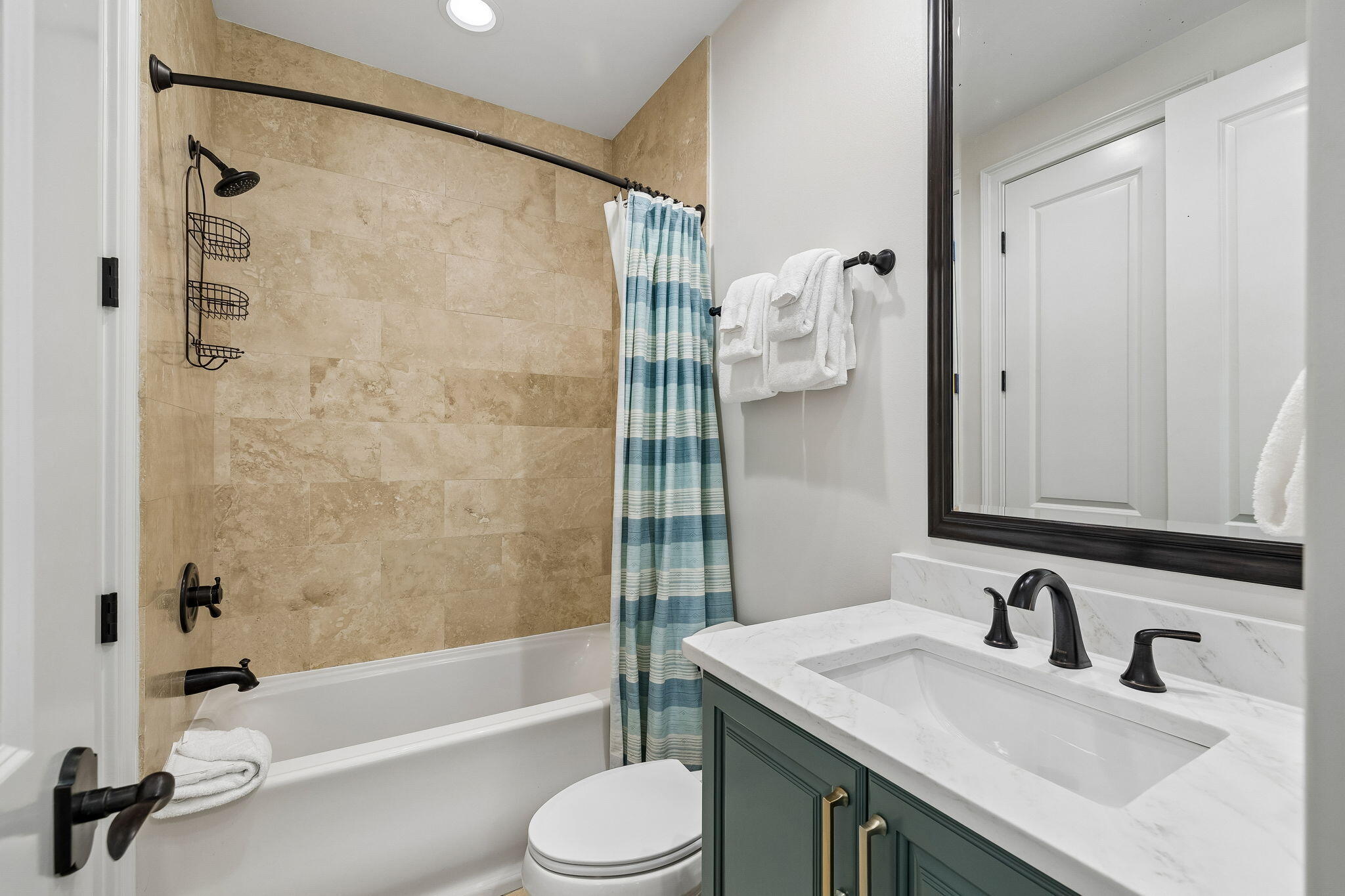 1973 Baytowne Loop Miramar Beach, FL 32550 - Photo 19 of 38 a bathroom with a granite countertop sink toilet and shower